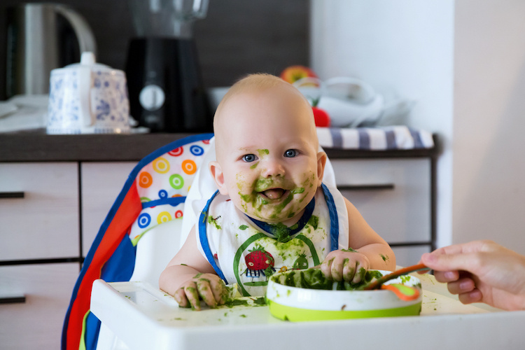 My Baby Just Started Eating Solids & It's Changed Her Poop. Is This Normal?