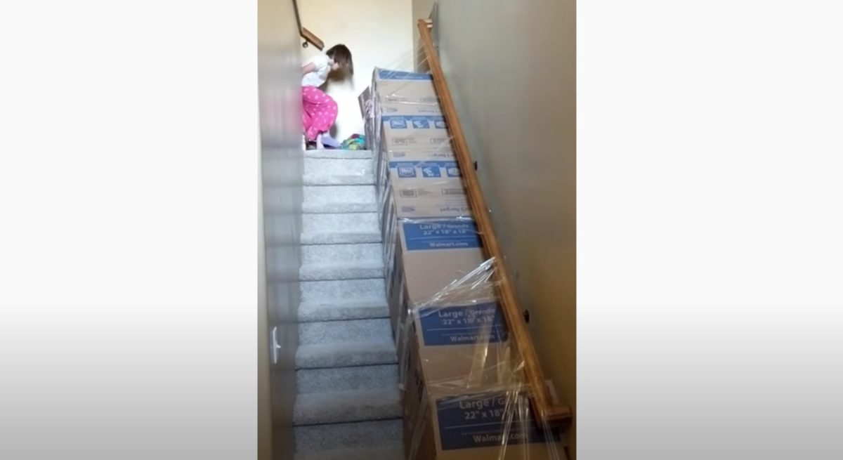 Dad Creates Quarantine Slide in Home for Kids... You Just Need Boxes and Tape