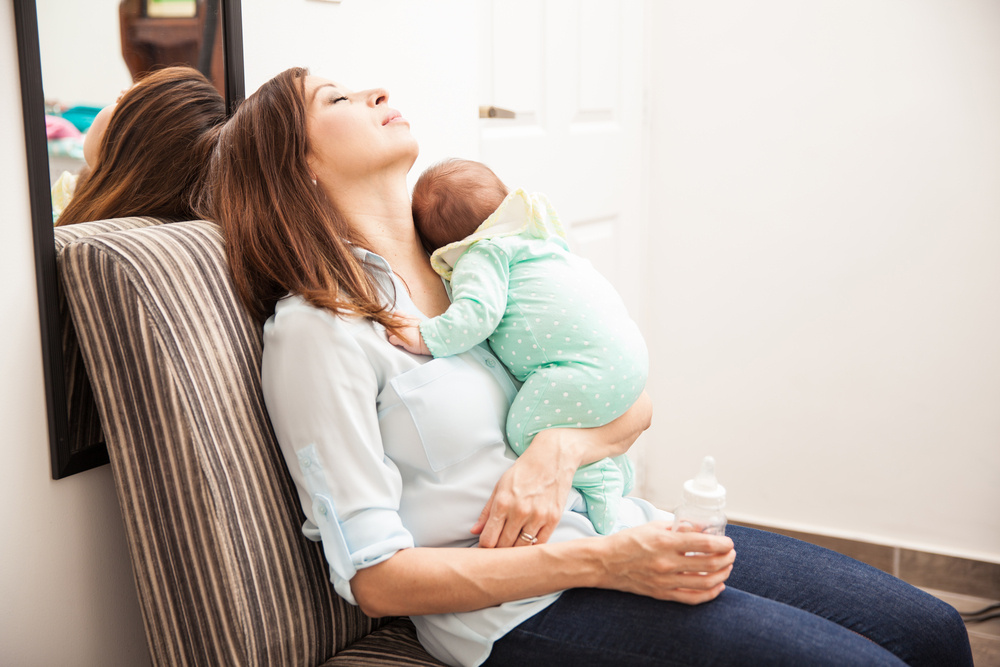 How Do I Get My Newborn to Sleep Anywhere Other Than My Arms?