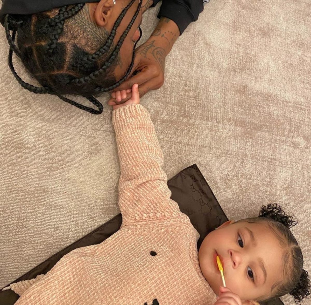 Travis Scott Keeps Daughter Stormi Aware Of Current Events