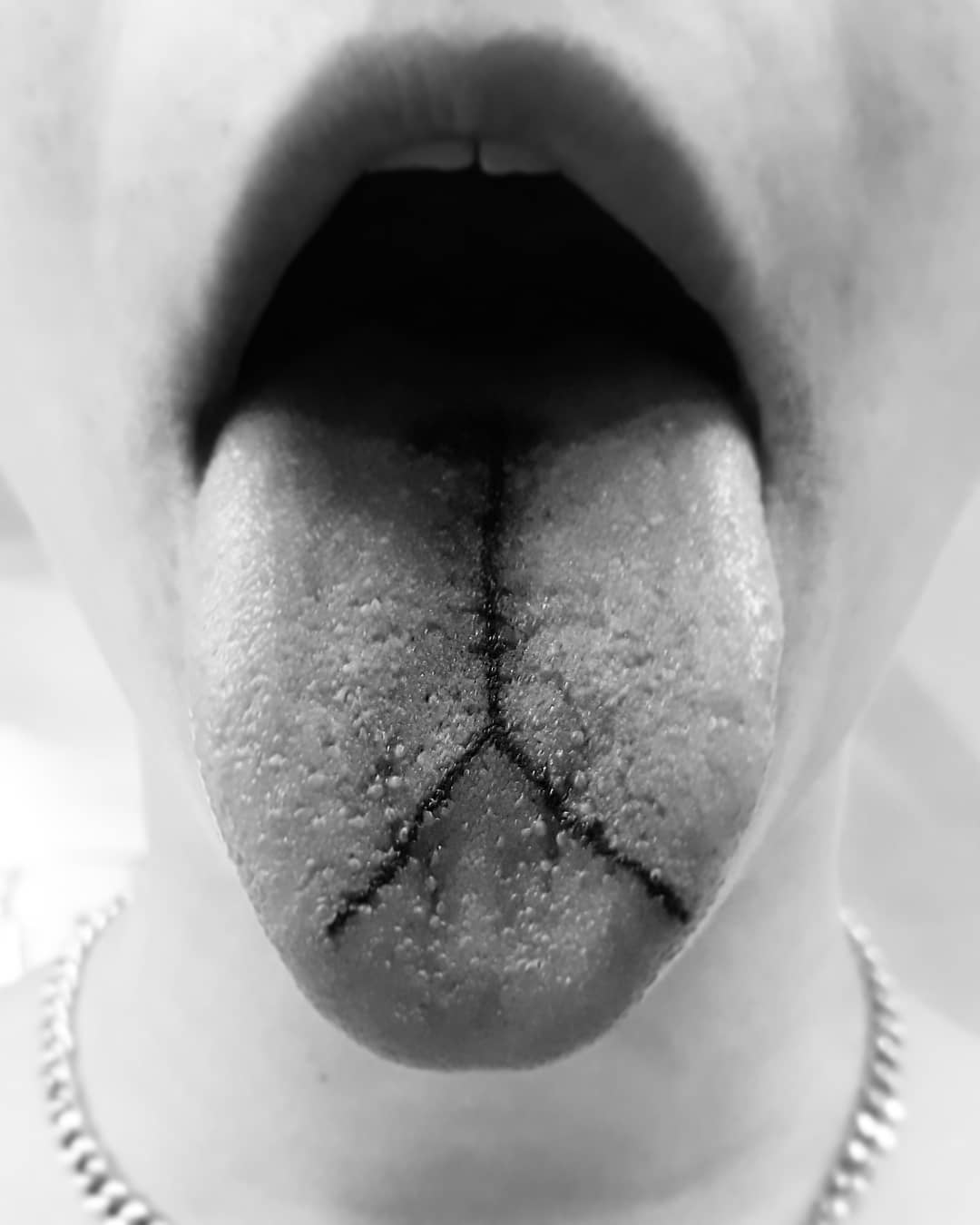 25 Real Tongue Tattoos That We Don't Have a Taste For