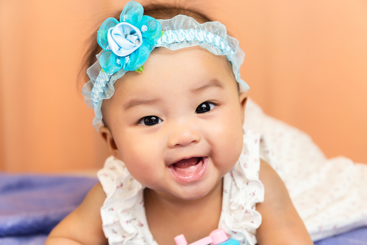 The Top 25 Baby Names for Girls Racing Up the Popularity Charts