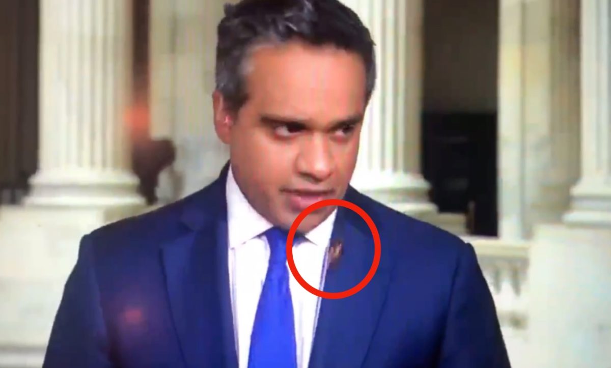 Watch CNN Reporter React to a Huge Cicada Crawling Up His Neck While Preparing for a Live Shot