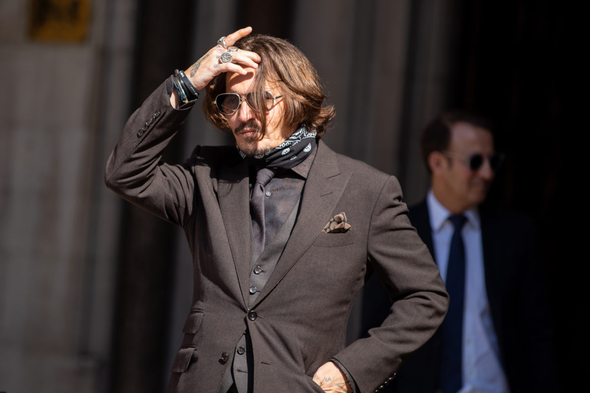 Johnny Depp First Pumps and Cheers While In The UK Over Defamation Verdict